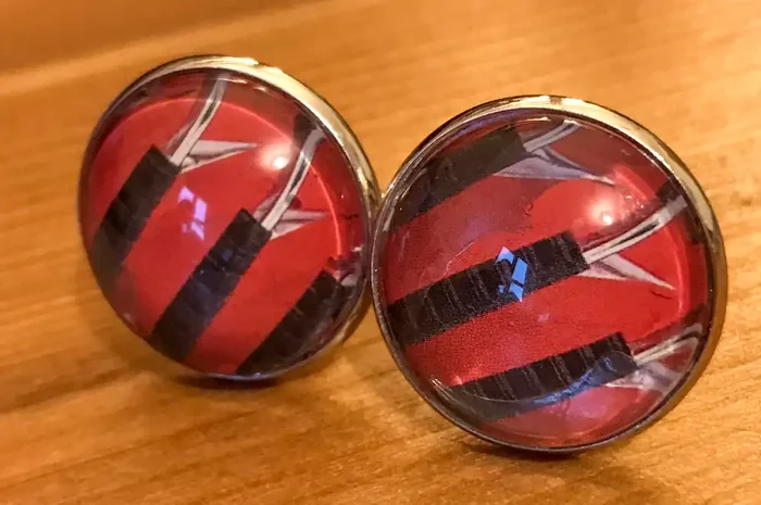 Cufflinks, featuring red accordion bellows